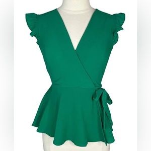 Dark green, faux wrap top with flutter sleeves and peplum style.